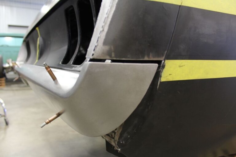 Custom 1969 Fastback Mustang with supercharged coyote engine rear bumper fabrication