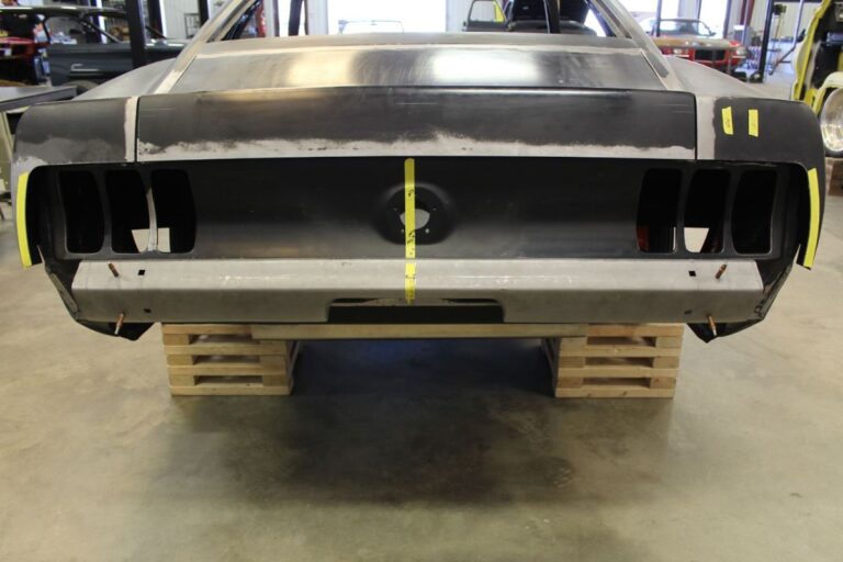 Custom 1969 Fastback Mustang with supercharged coyote engine rear bumper fabrication