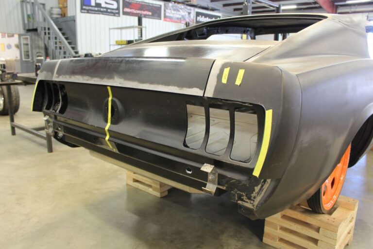 Custom 1969 Fastback Mustang with supercharged coyote engine rear end fabrication